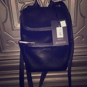 New/ Excellent condition Matt & Nat Mini bag pack